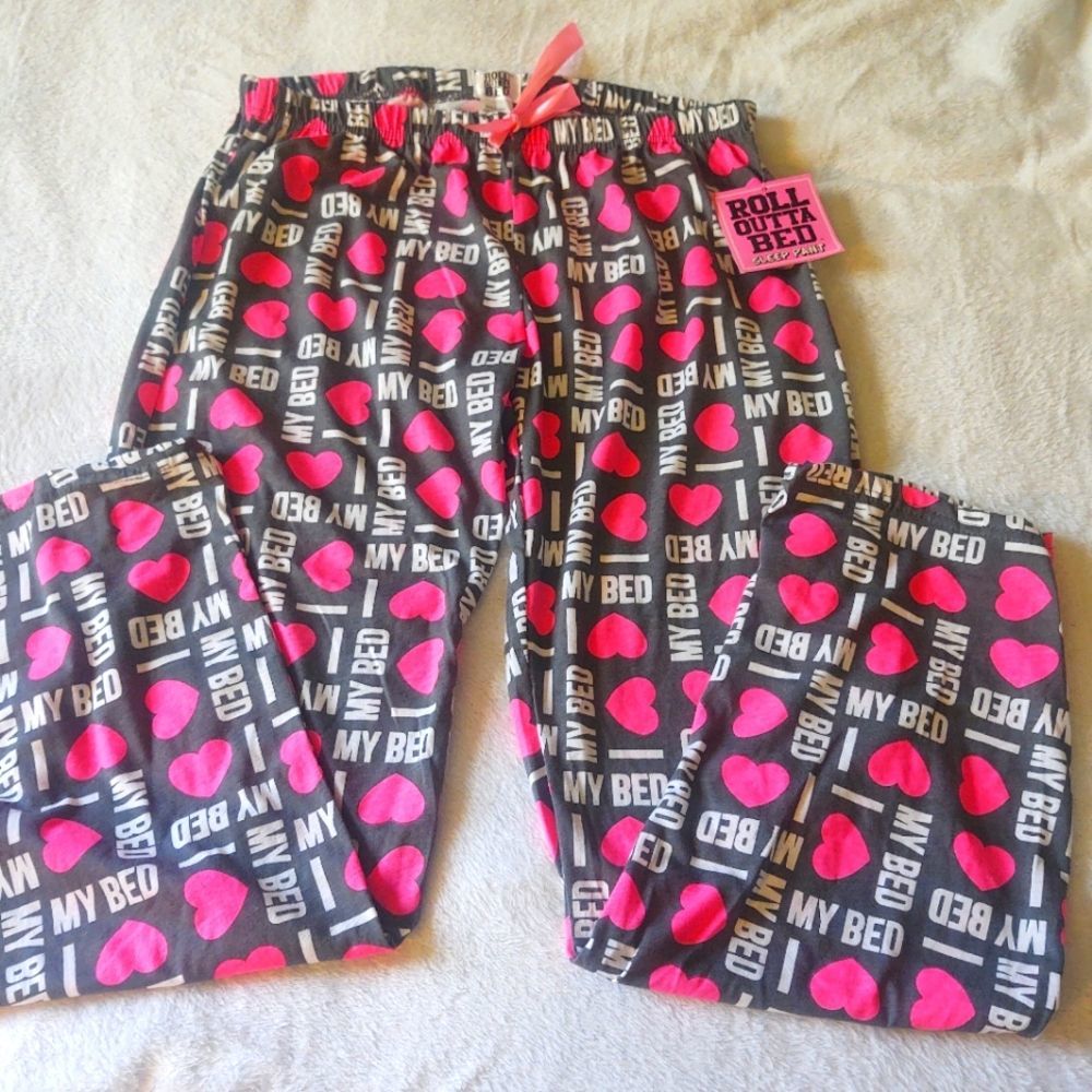 Roll Outta Bed sleep pants. Size M. Florescent pink hearts. NWT.